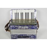 An Alvari two octave accordion in fitted case, 14" wide