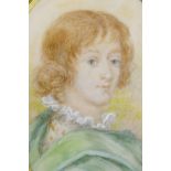 An oval mounted ebonised framed miniature portrait of a young man in green robes, 2½" x 3½"