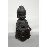 A Chinese cast bronze figure of Buddha seated in meditation, 10½" high