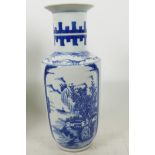 A Chinese blue and white porcelain vase with ribbed sides and panels of lakeside buildings, 6
