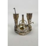 A silver plated Elkington & Co horse shoe cruet set, dated 1887, with a spur handle, removable