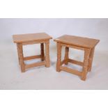 Foxman, Malcolm Pipes, a pair of oak stools, the legs with carved fox mask signature, 16" x 11" x