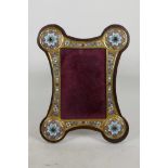 A Russian silver gilt and enamel photo frame decorated with enamelled and jewel set flowers and