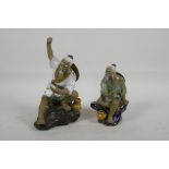 Two oriental porcelain figurines of fishermen, largest 8" high
