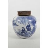 A Chinese blue and white porcelain ginger jar and hardwood cover, decorated with figures by a river,