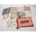 Ten scatter cushions, mostly embroidered and with floral decoration, largest 24" x 15"