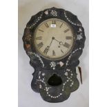 A C19th wall clock with papier mache case, inlaid with mother of pearl and spring driven movement,