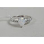 A 925 silver ring set with a pear shaped opalite and cubic zirconium shoulders, approximate size 'P'
