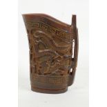 A Chinese faux horn jug carved with dragons, 4" high