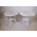 A pair of painted metal garden tables, 28" diameter