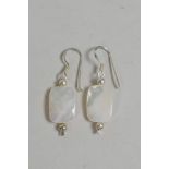 A pair of silver and blister pearl drop earrings