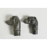 Two bronze walking stick handles in the form of dog heads, 3"