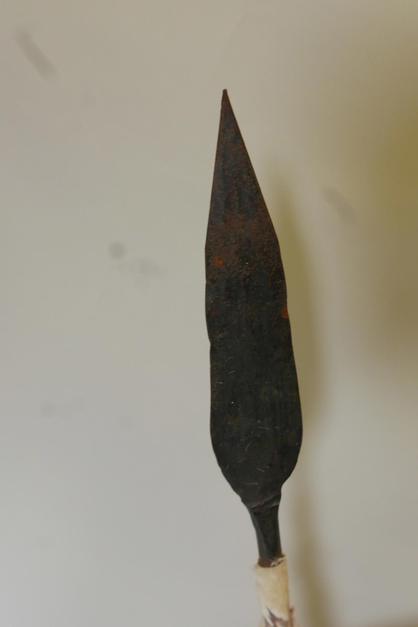 An African ceremonial display of leather shield with crossed club and spear, 7" long - Image 5 of 5