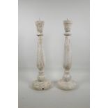 A pair of turned wood lamp bases, converted to pricket candlesticks, 18" high