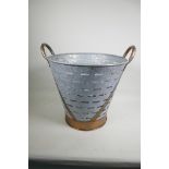 A galvanised olive bucket with anodised handles, 16" diameter