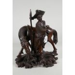 A Chinese carved wood figure of a warrior and horse, 14" high, minor faults