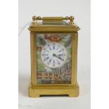 A brass cased miniature carriage clock decorated with porcelain panels in the Imari style, 2½" high
