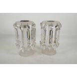 A pair of Victorian frosted glass mantle lustres with crystal prism drops, ten on each, together