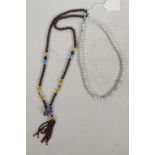 A jade bead necklace, 19" long, together with a hardstone necklace with cloisonné flower
