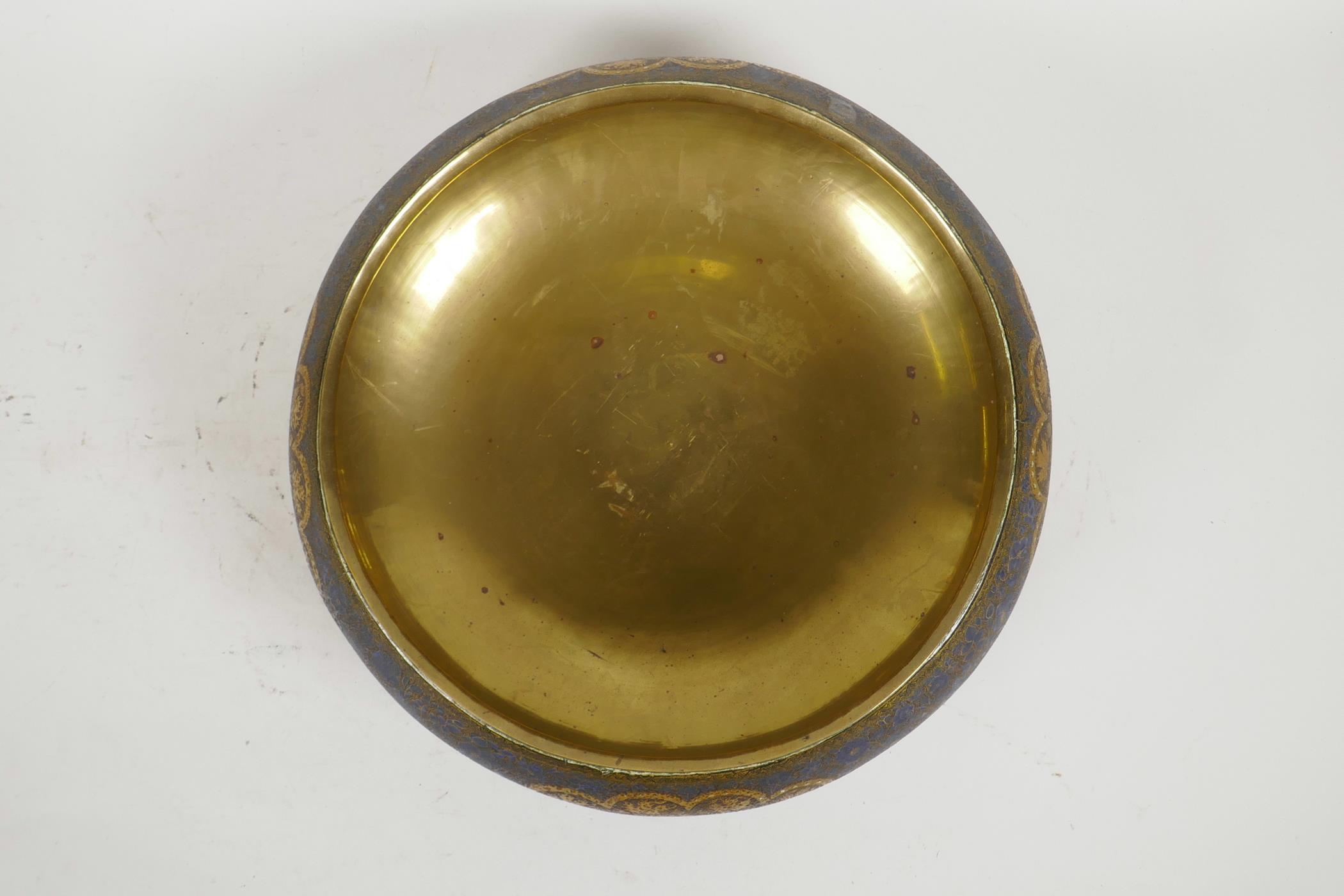 A Kashmiri brass and lacquer bowl with a rolled rim, decorated with gilt floral patterns, signed - Image 5 of 7