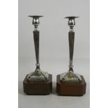 A pair of Chinese silver candlesticks, drilled for electricity, Chinese silver marks to base, 11"