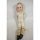 An Armand Marseille doll with bisque head, no.370, having sleeping eyes, open mouth and four teeth