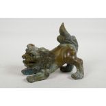 A Chinese bronze figurine of a kylin, 6" long
