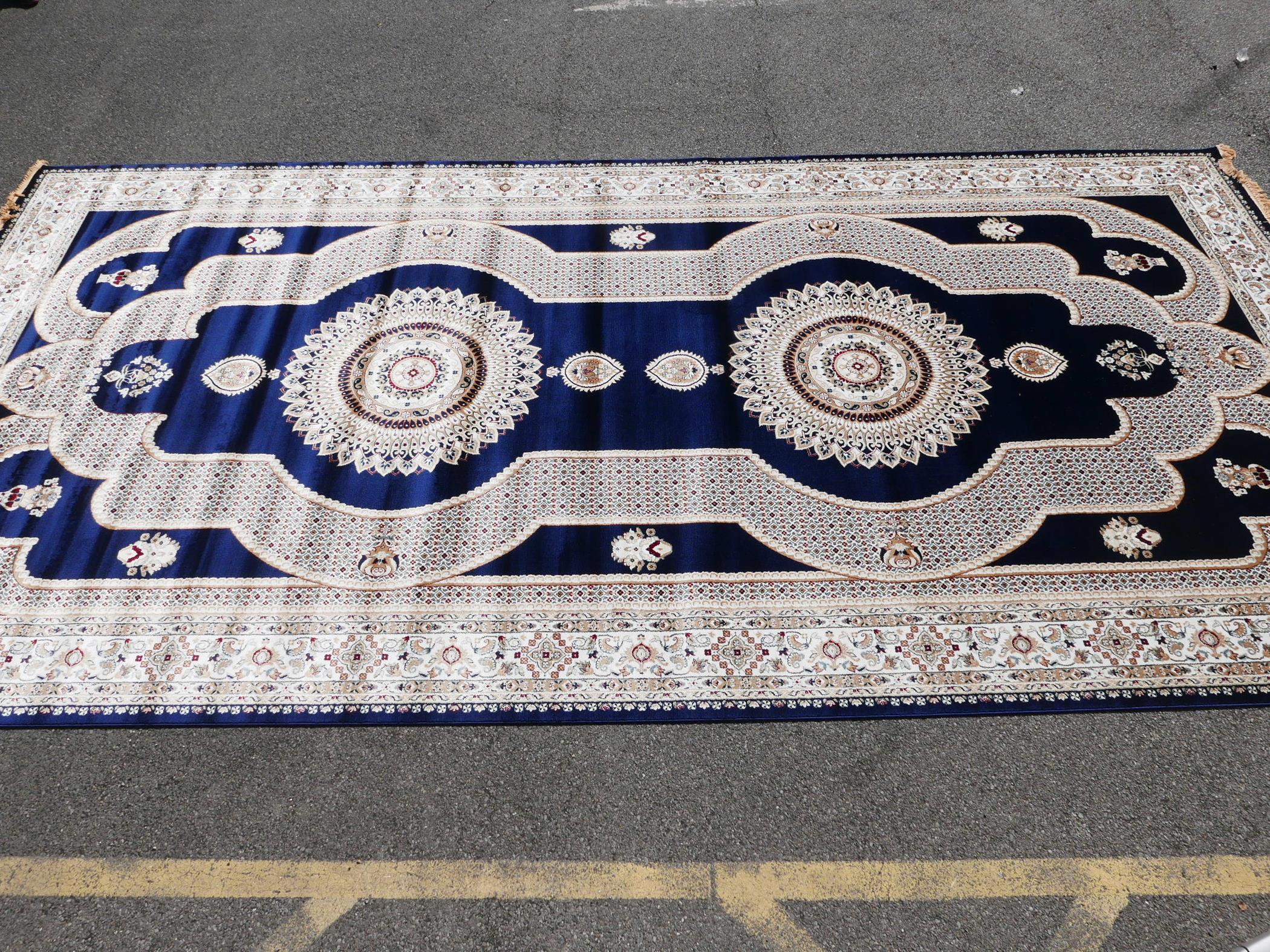 A large Turkish blue ground carpet with all over floral decoration, 118" x 240" - Image 3 of 7