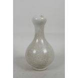 A Chinese crackle glazed vase of garlic head form, 7" high
