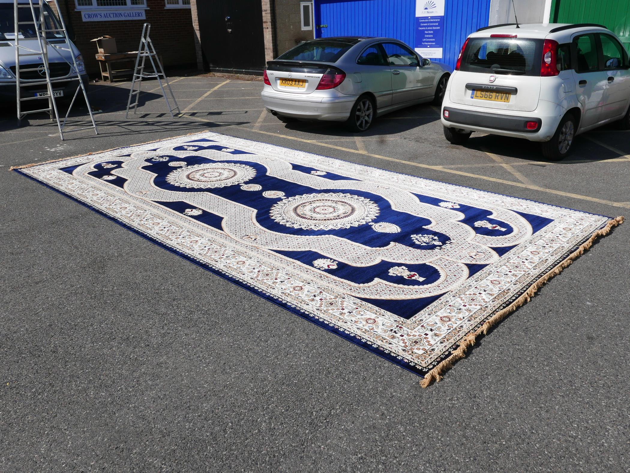 A large Turkish blue ground carpet with all over floral decoration, 118" x 240" - Image 4 of 7