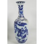 A Chinese blue and white porcelain vase decorated with figures in a garden scene, 6 character mark