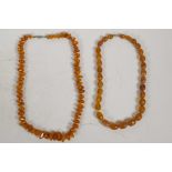 Two natural amber bead necklaces, longest 24"