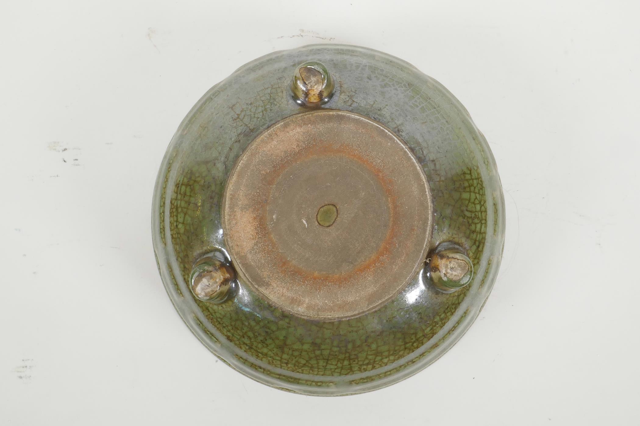 A Chinese olive green crackle glazed pottery bowl with tripod support, 9" diameter - Image 3 of 4