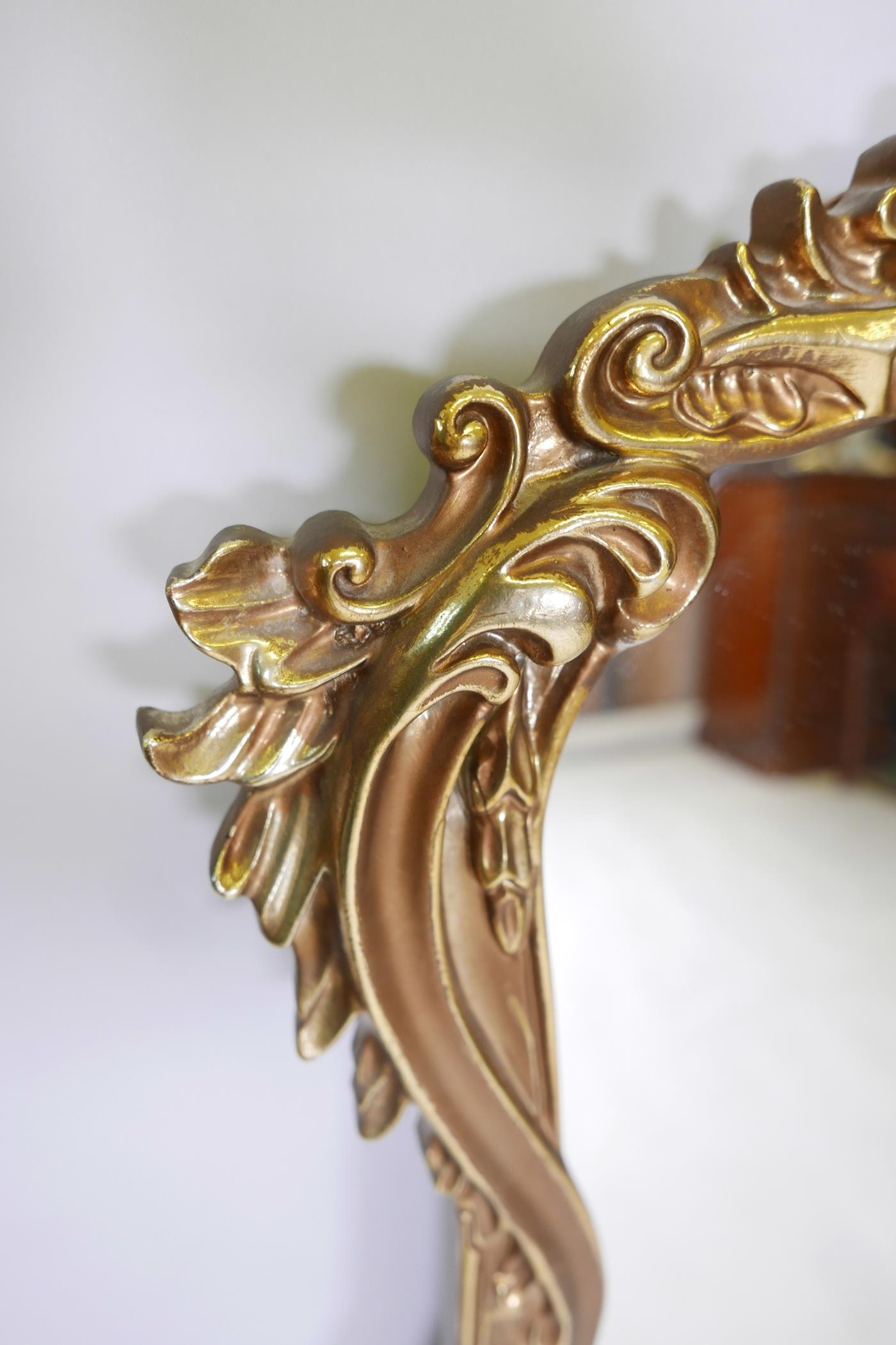 A Louis XV style Italian gold leaf mirror, featuring an elegant shape, and undulating intricately - Image 2 of 5