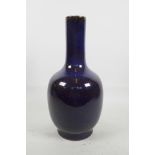 A Chinese purple flambé glazed porcelain vase, 13" high