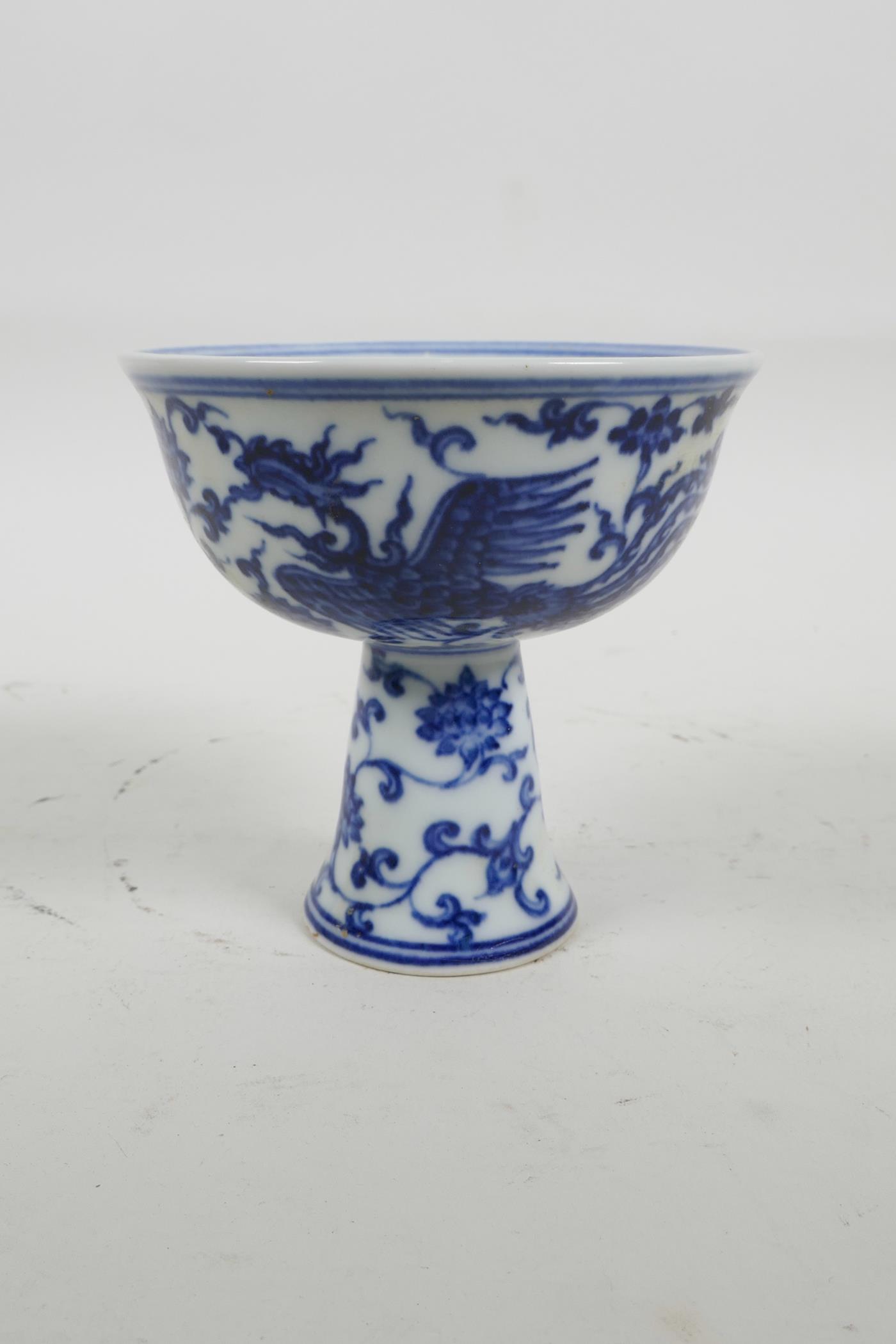 A blue and white porcelain stem bowl with phoenix decoration, 6 character mark to bowl - Image 2 of 4