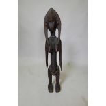 An African Malian hardwood female figure, 29½" high