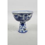 A blue and white porcelain stem bowl with phoenix decoration, 6 character mark to bowl