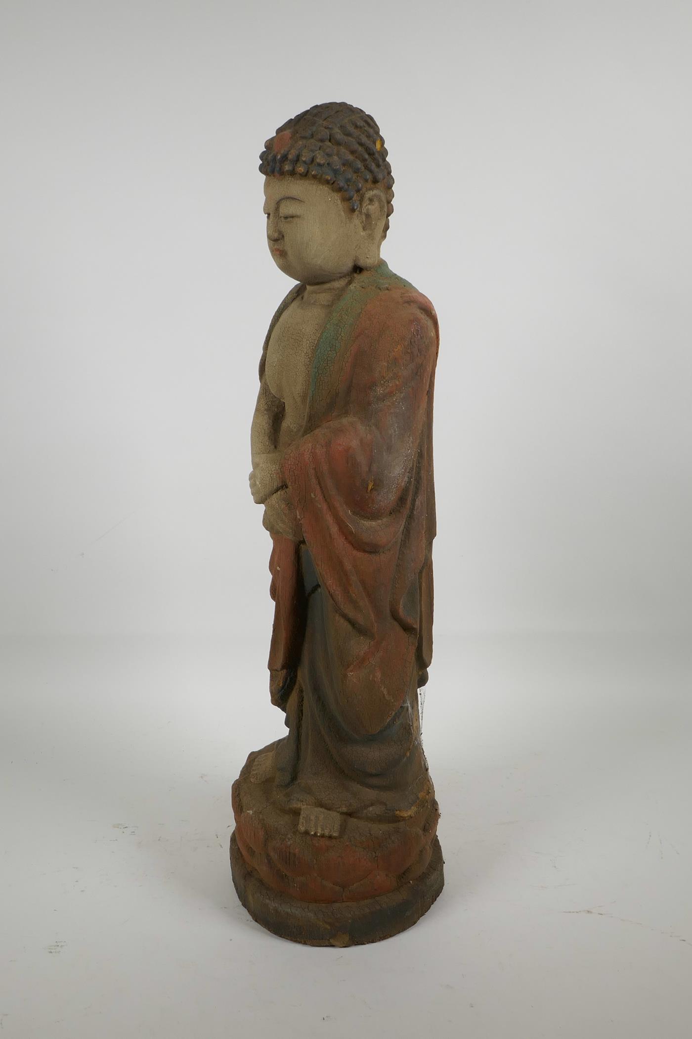 A Chinese carved wood Buddha with cracked polychrome paintwork, 22" high - Image 2 of 4