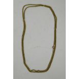 A brass longuard watch chain, 60" long