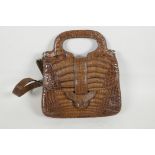 A crocodile skin handbag by Jaguar, with shoulder strap, 9½" x 9½"