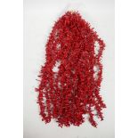 Sixteen strings of natural formed coral, 17" long