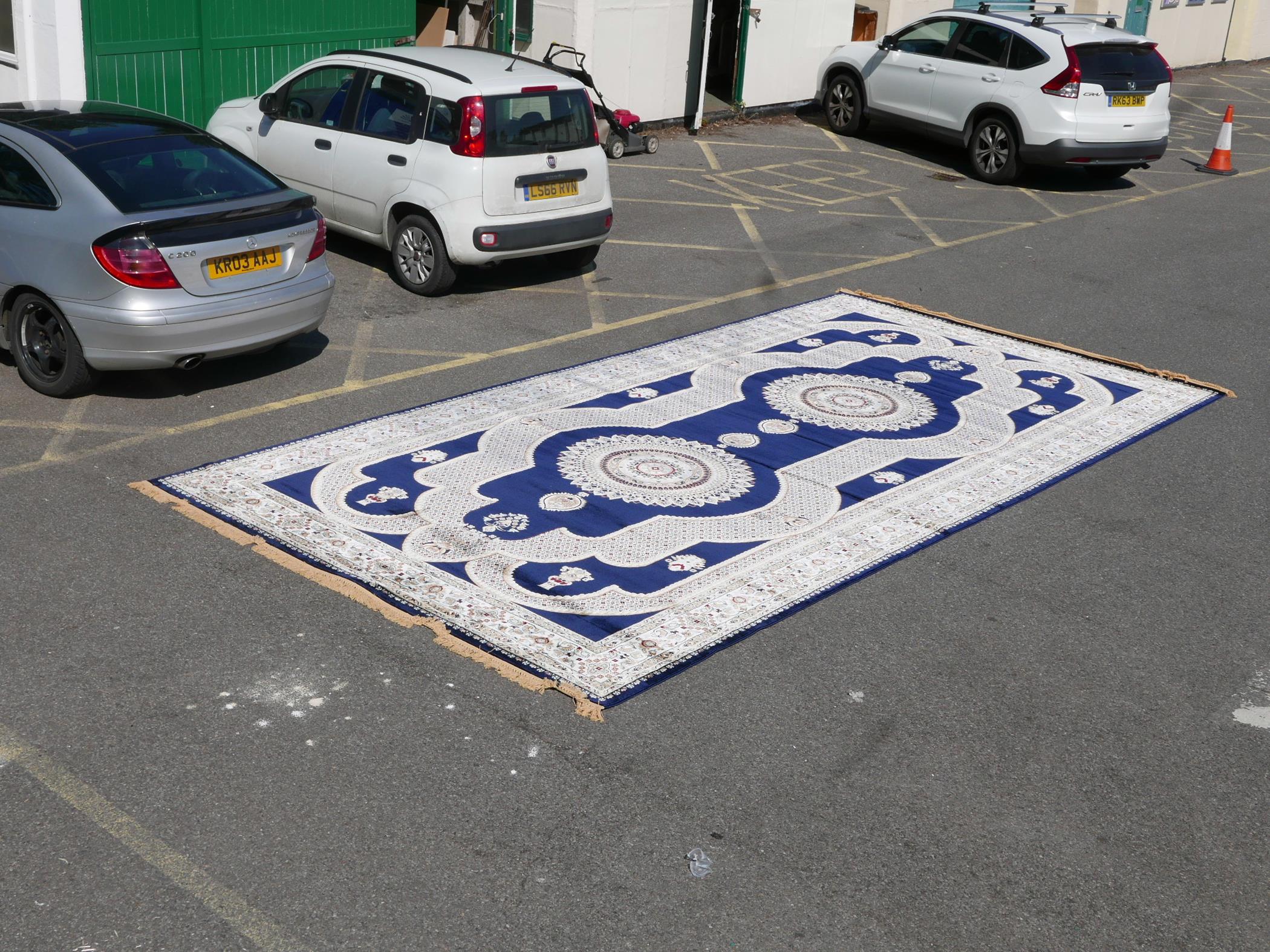 A large Turkish blue ground carpet with all over floral decoration, 118" x 240" - Image 2 of 7