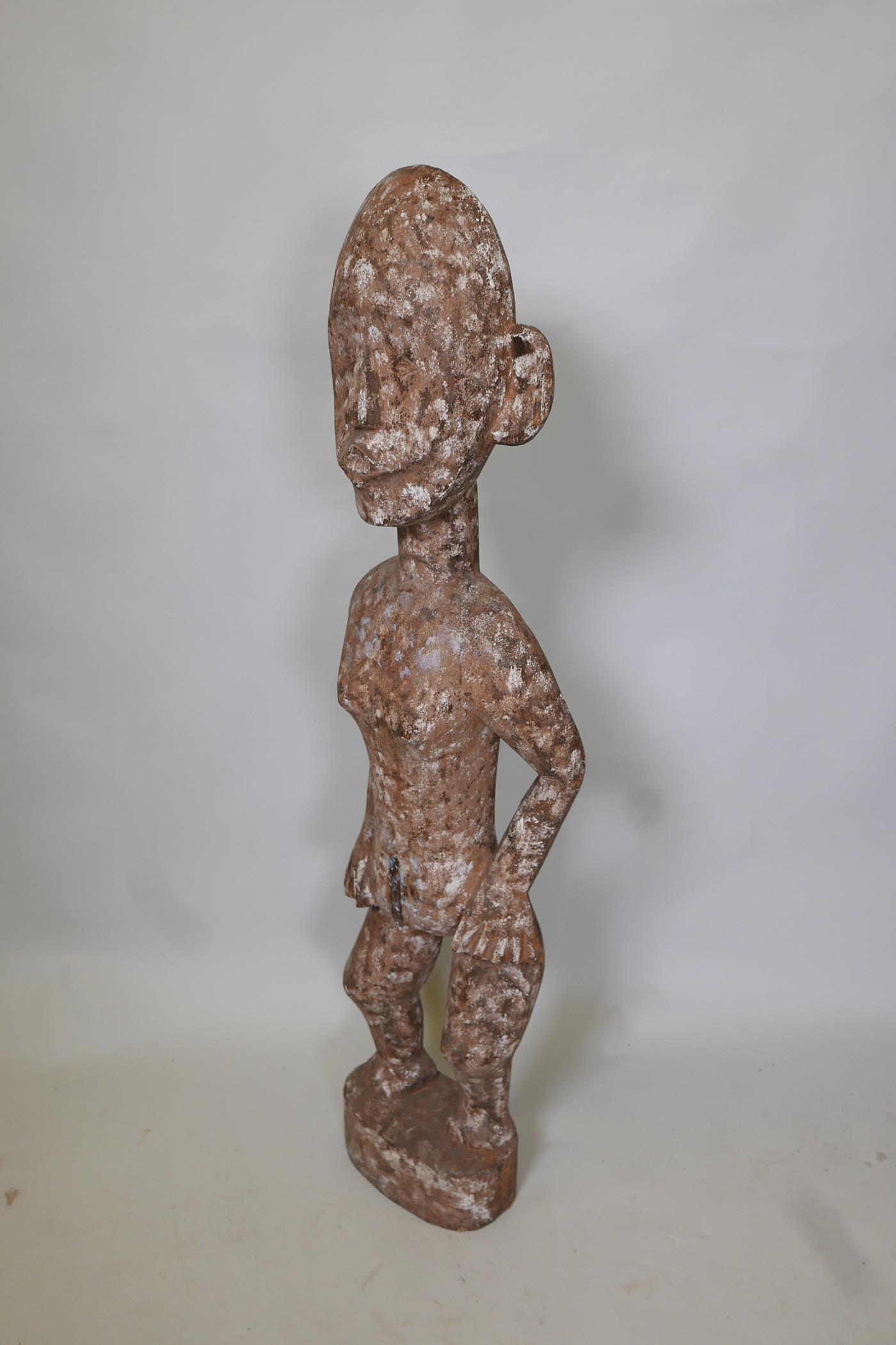 An African carved wood ethnic figure of a man, 40" high - Image 2 of 2