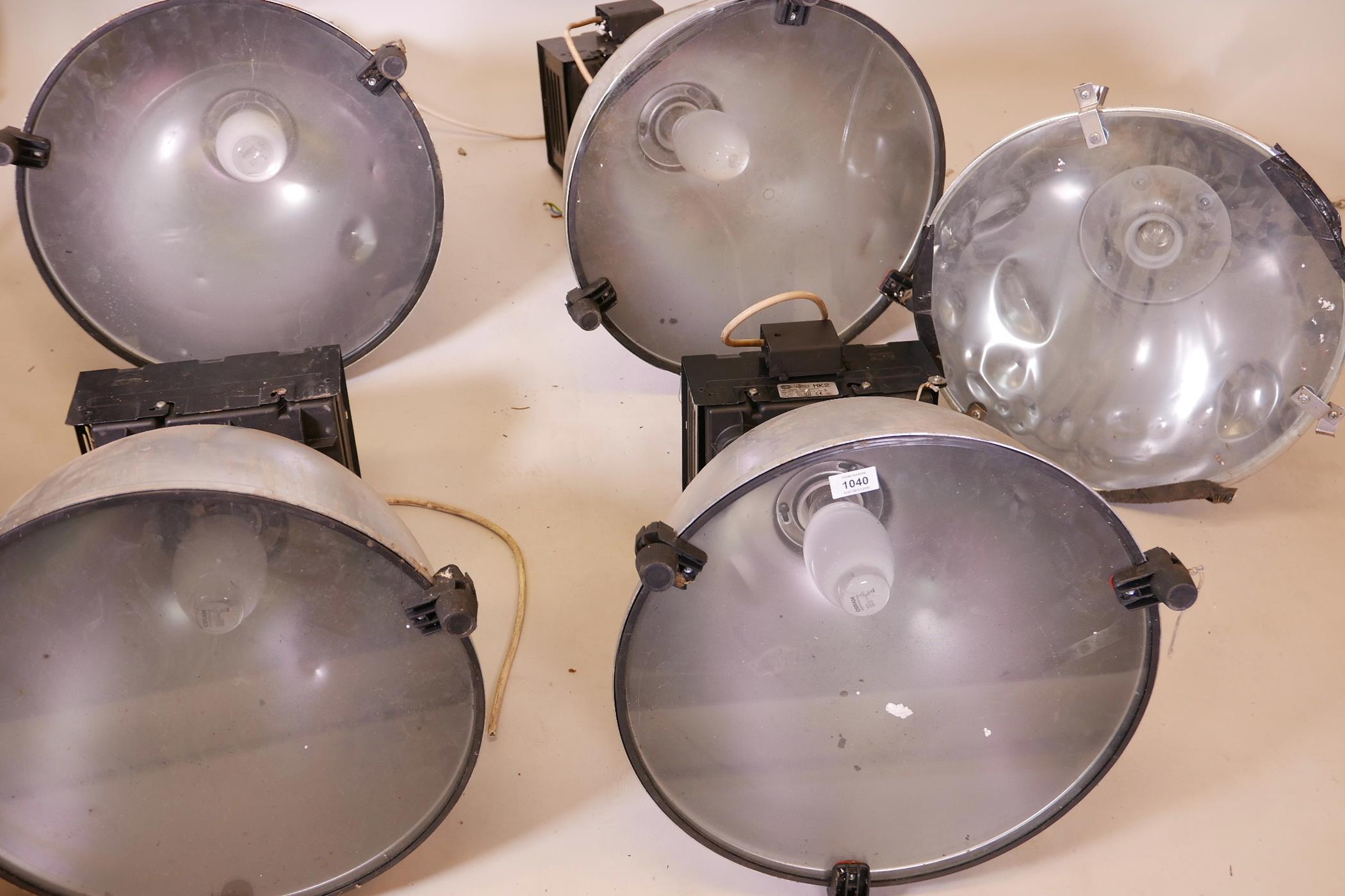 A set of four Fitzgerald Mk2 250W sodium spotlights, 19" x 20", and a smaller Hilclare lamp