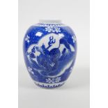 A Chinese blue and white porcelain jar with cracked ice decoration, with panels depicting kylin, six