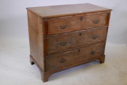 A C18th figured and burr walnut chest of three long drawers, raised on bracket supports, 40" x 20" x