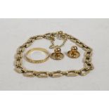 A 9ct gold chain link bracelet, 6" long, an 18ct gold wedding band, 1.6g, and a pair of 9ct gold