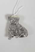 A sterling silver brooch in the form of a pug in a sweater, 1" x 1½"