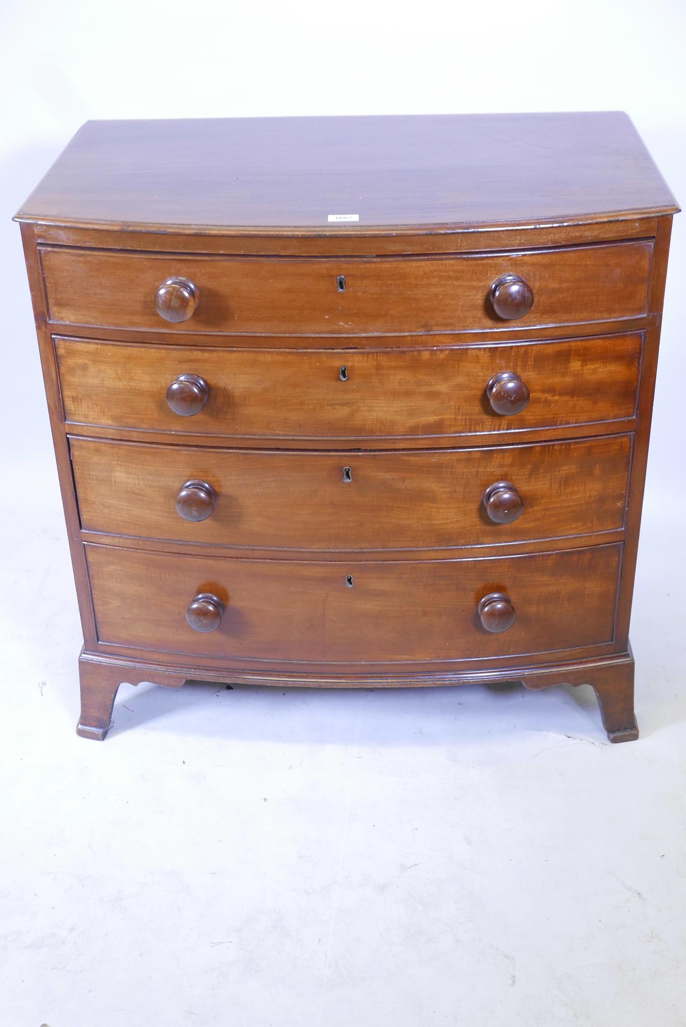 A C19th mahogany bowfront chest of four long drawers, raised on swept supports, reduced, 34" x 21" x - Image 2 of 3